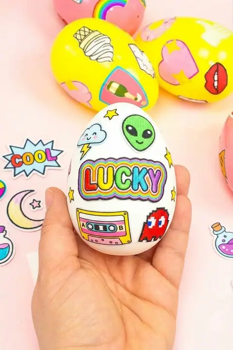 Bright Easter egg patch held in a hand